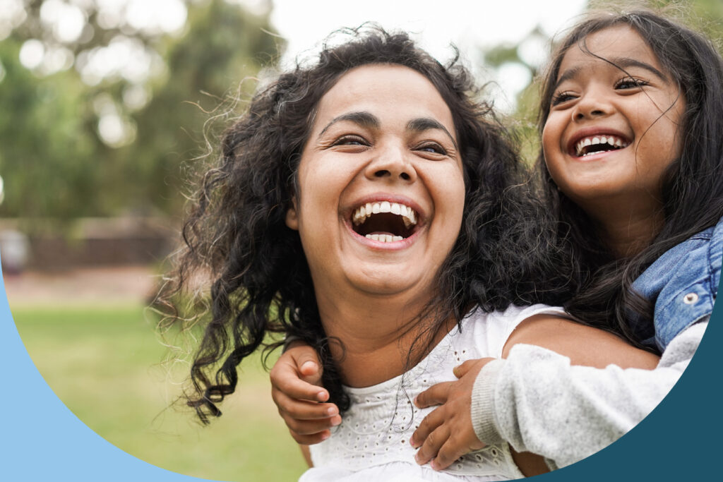 custody-of-children-header Daughter on mothers shoulders both laughing